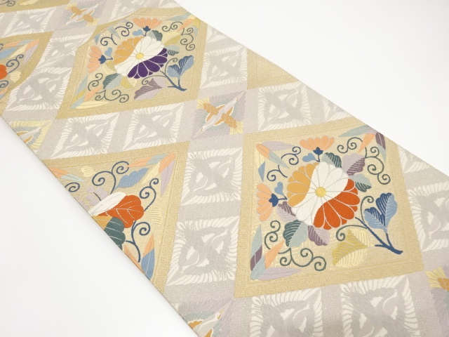 菱に菊唐草・向かい鶴模様織り出し袋帯